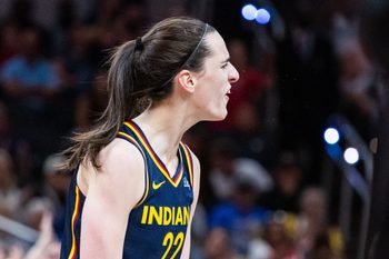 Jun 17, 2025; Indianapolis, Indiana, USA; Indiana Fever guard Caitlin Clark (22) celebrates in the second half against the Connecticut Sun at Gainbridge Fieldhouse. Mandatory Credit: Trevor Ruszkowski-Imagn Images