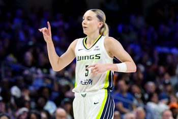 Jun 17, 2025; Arlington, Texas, USA;  Dallas Wings guard Paige Bueckers (5) reacts during the second half against the Golden State Valkyries at College Park Center. Mandatory Credit: Kevin Jairaj-Imagn Images