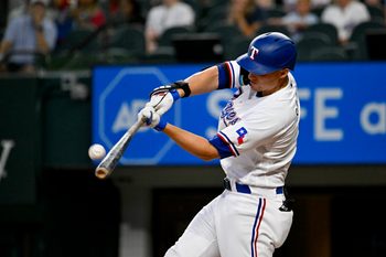 Aug 3, 2023; Arlington, Texas, USA; Texas Rangers designated hitter Corey Seagar (5) bats against the Chicago White Sox during the third inning at Globe Life Field. Mandatory Credit: Jerome Miron-Imagn Images