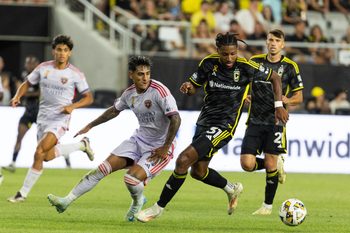 Sep 21, 2024; Columbus, Ohio, USA; Columbus Crew defender Steven Moreira (31) dribbles the ball while Orlando City midfielder Facundo Torres (10) defends in the second half at Lower.com Field. Mandatory Credit: Trevor Ruszkowski-Imagn Images