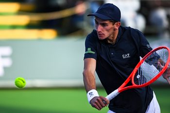 Mar 6, 2025; Indian Wells, CA, USA; Matteo Arnaldi (ITA) hits a ball against Aleksander Kovacevic (USA) in the BNP Paribas Open at the Indian Well Tennis Garden. Mandatory Credit: Jonathan Hui-Imagn Images