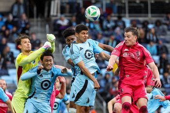 May 21, 2025; St. Paul, Minnesota, USA; Minnesota United and St. Louis City players jump for a corner kick during the first half of the US Open Cup-Round of 16 match at Allianz Field. Mandatory Credit: Matt Krohn-Imagn Images