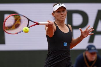 May 27, 2025; Paris, FR; Varvara Gracheva of France returns a shot during her match against Sofia Kenin of the United States on day three at Roland Garros Stadium. Mandatory Credit: Susan Mullane-Imagn Images