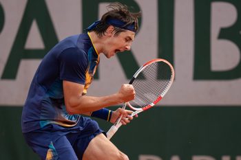 May 29, 2025; Paris, FR; Alexander Shevchenko of Kazakhstan reacts to a point during his match against Ethan Quinn of the United States on day five at Roland Garros Stadium.  Mandatory Credit: Susan Mullane-Imagn Images
