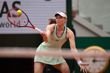 Jun 1, 2025; Paris, FR; Elena Rybakina of Kazakhstan returns a shot during her match against Iga Swiatek of Poland on day eight at Roland Garros Stadium.  Mandatory Credit: Susan Mullane-Imagn Images