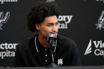 Jun 28, 2025; San Antonio, TX, USA; San Antonio Spurs first round draft pick Dylan Harper answers questions during press conference at Victory Capital Performance Center. Mandatory Credit: Scott Wachter-Imagn Images