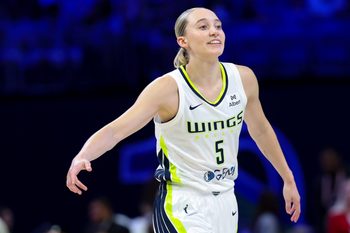 Jul 3, 2025; Arlington, Texas, USA;  Dallas Wings guard Paige Bueckers (5) reacts against the Phoenix Mercury  during the first half at College Park Center. Mandatory Credit: Kevin Jairaj-Imagn Images