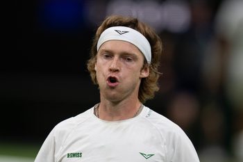 Jul 6, 2025; Wimbledon, United Kingdom; Andrey Rublev reacts to a point during his match against Carlos Alcaraz of Spain on day seven at the All England Lawn Tennis and Croquet Club. Mandatory Credit: Susan Mullane-Imagn Images