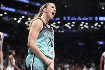 Jul 8, 2025; Brooklyn, New York, USA;  New York Liberty guard Sabrina Ionescu (20) celebrates after scoring in the fourth quarter against the Las Vegas Aces at Barclays Center. Mandatory Credit: Wendell Cruz-Imagn Images