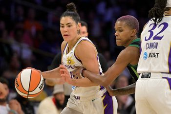 Jul 10, 2025; Los Angeles, California, USA;  Los Angeles Sparks guard Kelsey Plum (10) drives past Minnesota Lynx guard Courtney Williams (10) in the second half at Crypto.com Arena. Mandatory Credit: Jayne Kamin-Oncea-Imagn Images