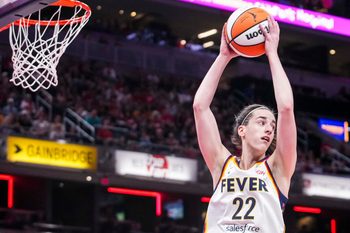 Indiana Fever guard Caitlin Clark (22) rebounds the ball Wednesday, July 9, 2025, during a game between the Indiana Fever and the Golden State Valkyries at Gainbridge Fieldhouse in Indianapolis. The Golden State Valkyries defeated the Indiana Fever, 80-61.