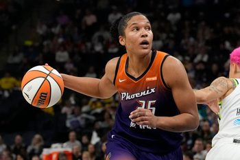 Jul 16, 2025; Minneapolis, Minnesota, USA; Phoenix Mercury forward Alyssa Thomas (25) goes to the basket against the Minnesota Lynx in the fourth quarter at Target Center. Mandatory Credit: Bruce Kluckhohn-Imagn Images