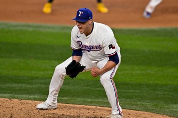 Jul 23, 2025; Arlington, Texas, USA; Texas Rangers relief pitcher Robert Garcia (62) celebrates after he pitches against the Athletics during the ninth inning at Globe Life Field. Mandatory Credit: Jerome Miron-Imagn Images
