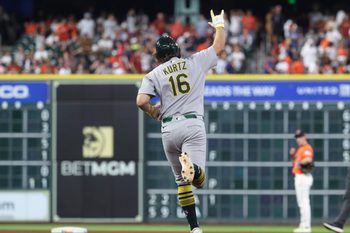 Jul 25, 2025; Houston, Texas, USA;  Athletics designated hitter Nick Kurtz (16) celebrates after hitting a home run during the sixth inning against the Houston Astros at Daikin Park. Mandatory Credit: Troy Taormina-Imagn Images