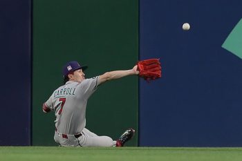 Jul 26, 2025; Pittsburgh, Pennsylvania, USA;  Arizona Diamondbacks center fielder Corbin Carroll (7) makes a catch for an out against Pittsburgh Pirates third baseman Ke'Bryan Hayes (not pictured) during the fourth inning at PNC Park. Mandatory Credit: Charles LeClaire-Imagn Images