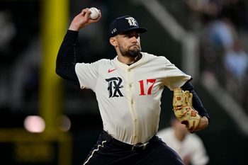 Jul 25, 2025; Arlington, Texas, USA; Texas Rangers starting pitcher Nathan Eovaldi (17) pitches during the game between the Texas Rangers and the Atlanta Braves at Globe Life Field. Mandatory Credit: Jerome Miron-Imagn Images