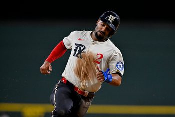 Jul 25, 2025; Arlington, Texas, USA; Texas Rangers second baseman Marcus Semien (2) in action during the game between the Texas Rangers and the Atlanta Braves at Globe Life Field. Mandatory Credit: Jerome Miron-Imagn Images