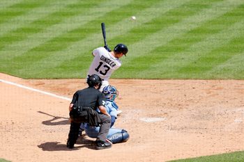 Jul 27, 2025; Detroit, Michigan, USA;  Detroit Tigers catcher Dillon Dingler (13) hits a three RBI single in the eighth inning at Comerica Park. Mandatory Credit: Rick Osentoski-Imagn Images