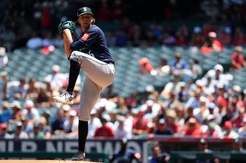 Jul 27, 2025; Anaheim, California, USA;  Seattle Mariners starting pitcher Logan Gilbert (36) pitches during the second inning against the Los Angeles Angels at Angel Stadium. Mandatory Credit: Kiyoshi Mio-Imagn Images