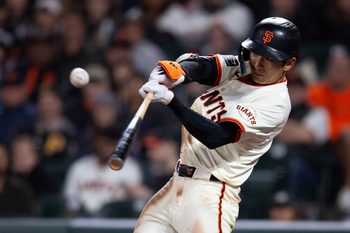 Jul 28, 2025; San Francisco, California, USA; San Francisco Giants center fielder Jung Hoo Lee (51) connects for an RBI single against the Pittsburgh Pirates during the ninth inning at Oracle Park. Mandatory Credit: D. Ross Cameron-Imagn Images