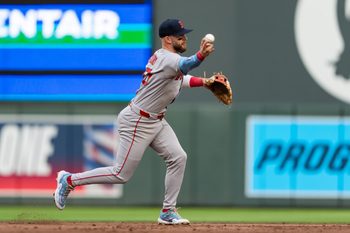 Jul 29, 2025; Minneapolis, Minnesota, USA; Boston Red Sox shortstop Trevor Story (10) throws to first base for the out during the second inning against the Minnesota Twins at Target Field. Mandatory Credit: Jordan Johnson-Imagn Images