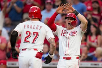 Cincinnati Reds right fielder Jake Fraley (27) crosses the plate on a two-run home run in the fourth inning of the MLB National League game between the Cincinnati Reds and the Los Angeles Dodgers at Great American Ball Park in downtown Cincinnati on Tuesday, July 29, 2025. The Reds led 3-2 after four innings.
