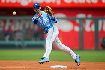 Jul 30, 2025; Kansas City, Missouri, USA; Kansas City Royals shortstop Bobby Witt Jr. (7) throws to first base during the first inning against the Atlanta Braves at Kauffman Stadium. Mandatory Credit: Jay Biggerstaff-Imagn Images