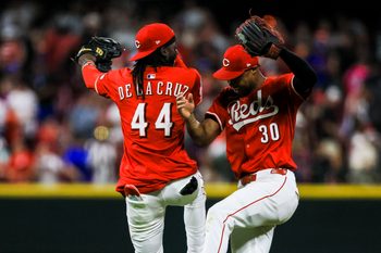 Jul 30, 2025; Cincinnati, Ohio, USA; Cincinnati Reds outfielder Will Benson (30) reacts with shortstop Elly De La Cruz (44) after the victory over the Los Angeles Dodgers at Great American Ball Park. Mandatory Credit: Katie Stratman-Imagn Images
