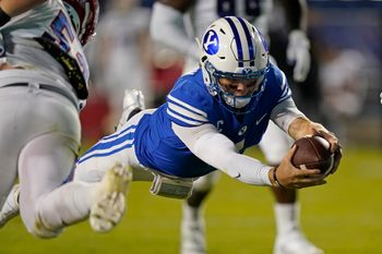 Oct 2, 2020; Provo, UT, USA; BYU quarterback Zach Wilson (1)scores against Louisiana Tech in the second half during an NCAA college football game Friday, Oct. 2, 2020, in Provo, Utah.  Mandatory Credit: Rick Bowmer/Pool Photo-Imagn Images