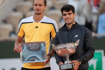 Jun 9, 2024; Paris, France; Carlos Alcaraz of Spain and Alexander Zverev of Germany pose with their trophies at the trophy presentation on day 15 of Roland Garros at Stade Roland Garros. Mandatory Credit: Susan Mullane-Imagn Images