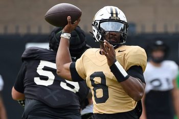 Vanderbilt quarterback Nate Johnson (8) passes during an NCAA college football practice Friday, Aug. 2, 2024, in Nashville, Tenn.