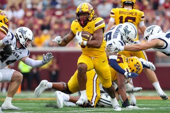 Sep 14, 2024; Minneapolis, Minnesota, USA; Minnesota Golden Gophers running back Jordan Nubin (27) runs the ball against the Nevada Wolf Pack during the second half at Huntington Bank Stadium. Mandatory Credit: Matt Krohn-Imagn Images