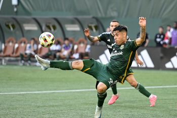 Oct 6, 2024; Portland, Oregon, USA; Portland Timbers forward Felipe Mora (9) kicks a shot on goal during the second half against FC Dallas at Providence Park. Mandatory Credit: Troy Wayrynen-Imagn Images