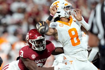 Oklahoma Sooners defense back Robert Spears-Jennings forces Tennessee Volunteers quarterback Nico Iamaleava (8) to fumble during a college football game between the University of Oklahoma Sooners (OU) and the Tennessee Volunteers at Gaylord Family - Oklahoma Memorial Stadium in Norman, Okla., Saturday, Sept. 21, 2024.