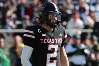 Nov 30, 2024; Lubbock, Texas, USA;  Texas Tech Red Raiders quarterback Behren Morton (2) in the first half during the game against the West Virginia Mountaineers at Jones AT&T Stadium and Cody Campbell Field. Mandatory Credit: Michael C. Johnson-Imagn Images