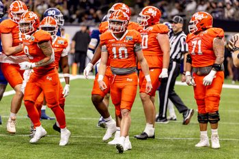 Dec 19, 2024; New Orleans, LA, USA;  Sam Houston State Bearkats quarterback Hunter Watson (10) reacts to scoring a touchdown against the Georgia Southern Eagles during the first half at Caesars Superdome. Mandatory Credit: Stephen Lew-Imagn Images