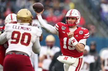 Dec 28, 2024; Bronx, NY, USA; Nebraska Cornhuskers quarterback Dylan Raiola (15) throws the ball during the second half against the Boston College Eagles at Yankee Stadium. Mandatory Credit: Vincent Carchietta-Imagn Images