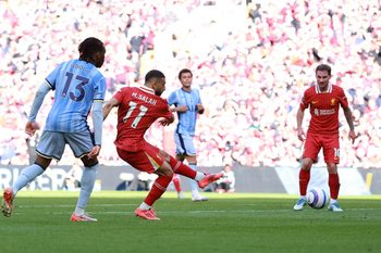 [US, Mexico & Canada customers only] April 27, 2025; Anfield, Liverpool, BRITAIN; Liverpool player Mohamed Salah scores the fourth goal against the Tottenham Hotspur in a Premier League match. Mandatory Credit: Phil Noble/Reuters via Imagn Images