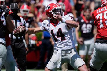 Georgia quarterback Gunner Stockton (14) throws a deep ball during the Georgia G-Day spring football game in Athens, Ga., on Saturday, April 12, 2025.