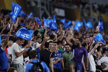 Jun 30, 2025; Orlando, Florida, USA; Al Hilal FC fans react in extra time against Manchester City during a round of 16 match of the 2025 FIFA Club World Cup at Camping World Stadium. Mandatory Credit: Nathan Ray Seebeck-Imagn Images