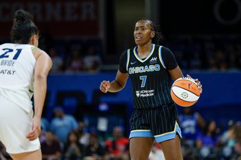 Jul 12, 2025; Chicago, Illinois, USA; Chicago Sky guard Ariel Atkins (7) brings the ball up court against the Minnesota Lynx during the second half of a WNBA game at Wintrust Arena. Mandatory Credit: Kamil Krzaczynski-Imagn Images