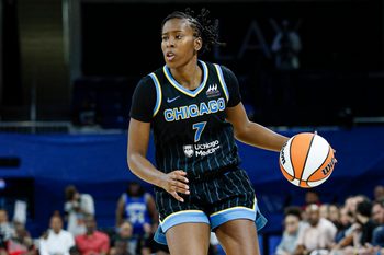 Jul 12, 2025; Chicago, Illinois, USA; Chicago Sky guard Ariel Atkins (7) brings the ball up court against the Minnesota Lynx during the second half of a WNBA game at Wintrust Arena. Mandatory Credit: Kamil Krzaczynski-Imagn Images