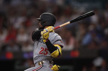 Jul 15, 2025; Cumberland, Georgia, USA; American League outfielder Byron Buxton (25) of the Minnesota Twins hits a double in the ninth inning during the 2025 MLB All Star Game at Truist Park. Mandatory Credit: Brett Davis-Imagn Images