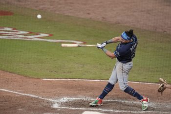 Jul 15, 2025; Cumberland, Georgia, USA; American League infielder Jonathan Aranda (62) of the Tampa Bay Rays hits a home run in the swing off after the 2025 MLB All Star Game ended in a tie at Truist Park. Mandatory Credit: Dale Zanine-Imagn Images