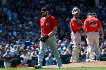 Jul 18, 2025; Chicago, Illinois, USA; Boston Red Sox starting pitcher Lucas Giolito (54) leaves a baseball game against the Chicago Cubs during the sixth inning at Wrigley Field. Mandatory Credit: Kamil Krzaczynski-Imagn Images