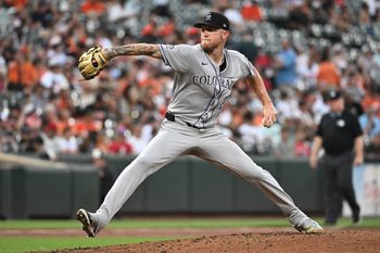 Jul 25, 2025; Baltimore, Maryland, USA;  Colorado Rockies pitcher Kyle Freeland (21) delivers a pitch during the second inning against the Baltimore Orioles at Oriole Park at Camden Yards. Mandatory Credit: James A. Pittman-Imagn Images