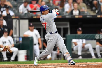 Jul 26, 2025; Chicago, Illinois, USA; Chicago Cubs designated hitter Seiya Suzuki (27) hits a single during the fourth inning against the Chicago White Sox at Rate Field. Mandatory Credit: Patrick Gorski-Imagn Images