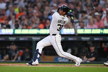 Jul 29, 2025; Detroit, Michigan, USA;  Detroit Tigers left fielder Riley Greene (31) hits an RBI double against the Arizona Diamondbacks in the sixth inning at Comerica Park. Mandatory Credit: Lon Horwedel-Imagn Images