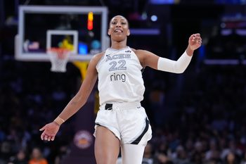 Jul 29, 2025; Los Angeles, California, USA; Las Vegas Aces center A'ja Wilson (22) reacts in the second half against the LA Sparks at Crypto.com Arena. Mandatory Credit: Kirby Lee-Imagn Images