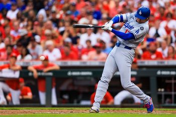 Jul 30, 2025; Cincinnati, Ohio, USA; Los Angeles Dodgers designated hitter Shohei Ohtani (17) bats in the fourth inning against the Cincinnati Reds at Great American Ball Park. Mandatory Credit: Katie Stratman-Imagn Images